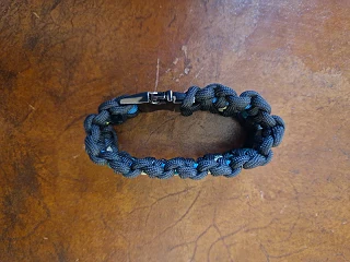Paracord with metal clamp